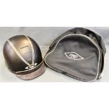 A PRO TECTOR SNELL E2001 RIDING HAT size 7 3/8 (59cm), in a protective bag. Note: According to the