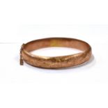 A 9CT ROSE GOLD GEORGE V BANGLE the half patterned bangle measures approx. 6.5cm in diameter and 1.