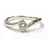 AN 18CT WHITE GOLD 0.33CT ROUND CUT DIAMOND SOLITAIRE RING the shank marked 750 0.33 CT, ring size