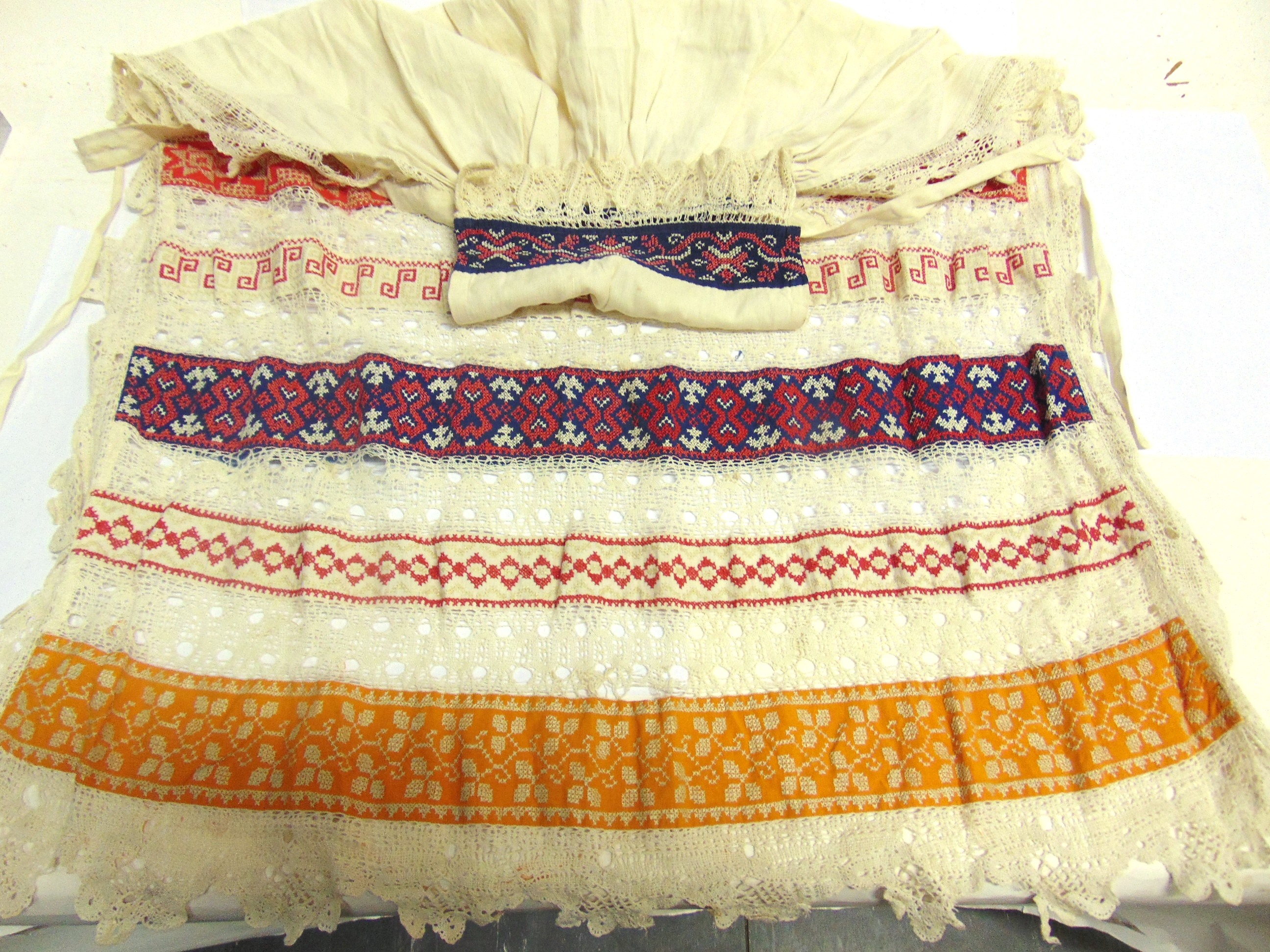 TWO TRADITIONAL EMBROIDERED FOLK APRONS, PROBABLY RUSSIAN early 20th century, one 112cm long, the - Image 2 of 3
