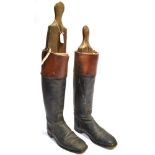 PAIR OF GENTLEMAN'S BLACK WITH BROWN LEATHER TOP RIDING BOOTS with trees, approximately size 10