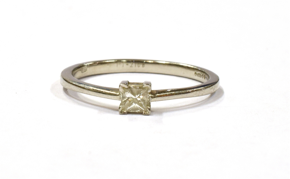 A PLATINUM AND DIAMOND SOLITAIRE RING the princess cut diamond measuring approx. 4mm in diameter,