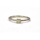 A PLATINUM AND DIAMOND SOLITAIRE RING the princess cut diamond measuring approx. 4mm in diameter,