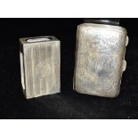 A VICTORIAN SILVER CIGARETTE CASE and white metal match box cover, the cigarette case embossed