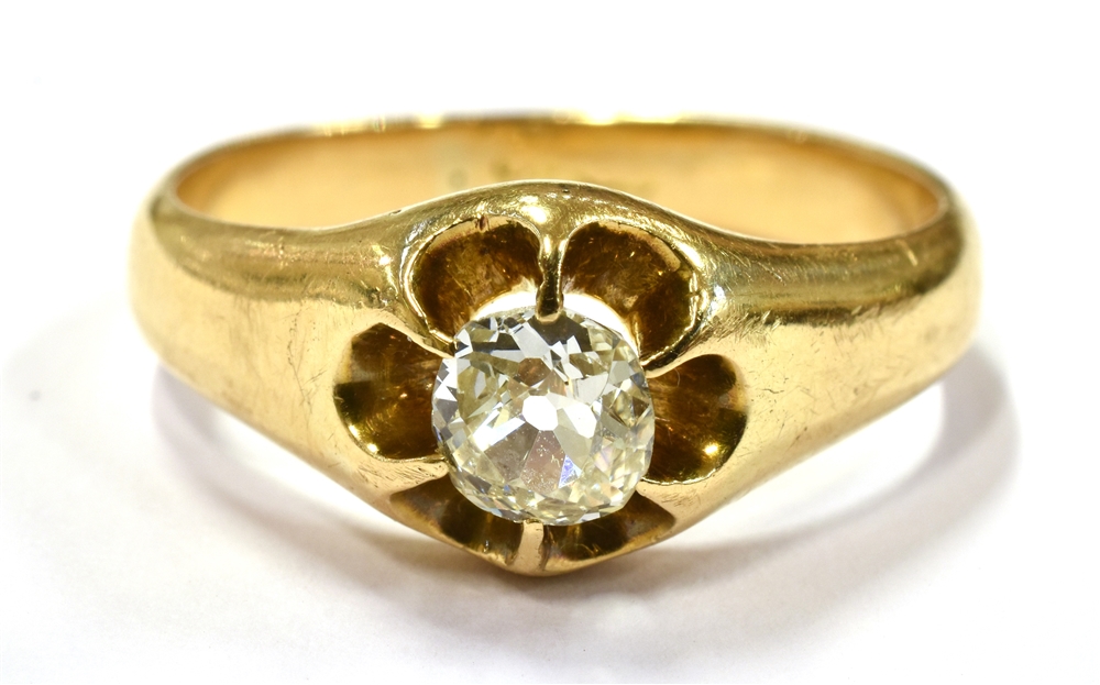 AN OLD CUT DIAMOND SET 18CT GOLD RING the buttercup claw set front comprising a cushion shaped old