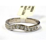 A PLATINUM AND MOISSANITE WISHBONE RING boxed and certified, marked 950 Birmingham, ring size L,