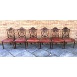 SIX MAHOGANY SHIELD BACK DINING CHAIRS with leather seats and with tapering legs, H 95cm