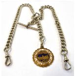 A SILVER ALBERT CHAIN with silver T bar and an attached railway men medal, 44cm long, weight