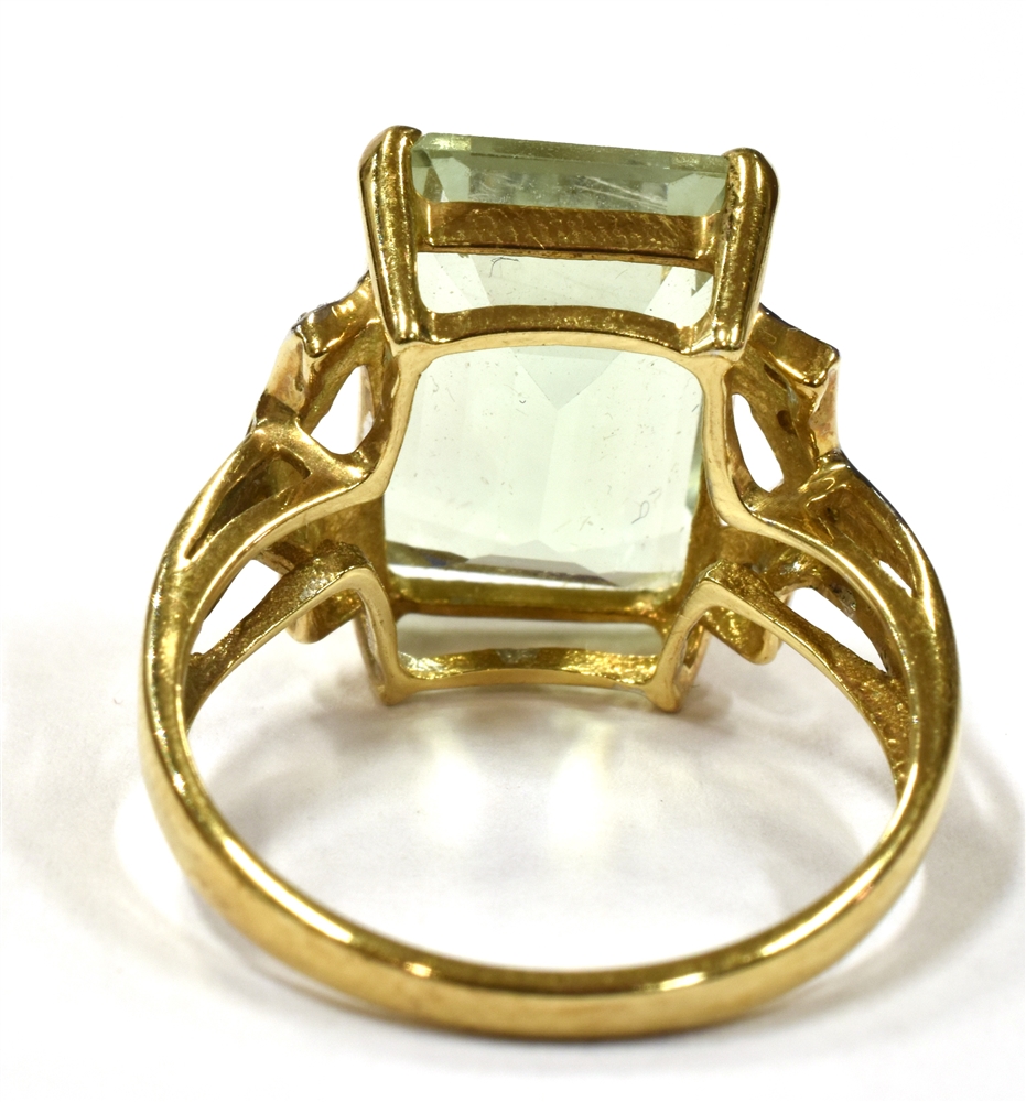 A 9CT GOLD AQUAMARINE COCKTAIL RING the step cut aquamarine measuring approx. 1.4cm by 1cm, with - Image 4 of 4