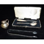 A CASED SET OF SILVER FLATWARE (2) together with a pair of silver tongs and a silver pepper pot with