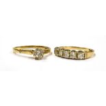 TWO 9CT GOLD CUBIC ZIRCONIA RINGS comprising a 9ct gold solitaire cubic zirconia with the stone