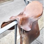 A STUBBEN SIEGFRIED CHESTNUT SADDLE made in Germany and number 27017