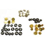 A COLLECTION OF METAL AND PLASTIC BUTTONS various initials