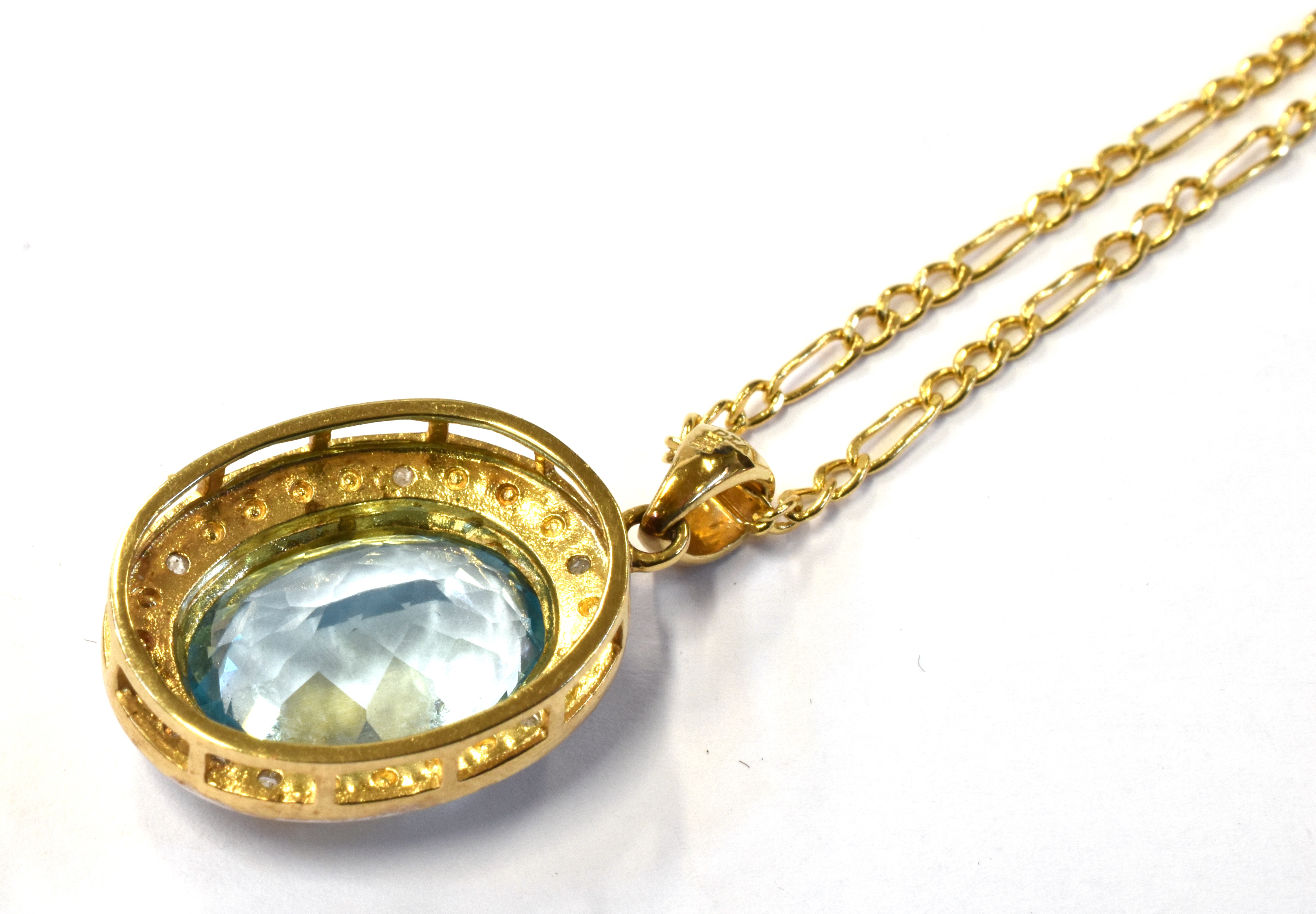 A 9CT GOLD, SAPPHIRE AND DIAMOND ACCENT PENDANT the oval sapphire mounted in diamond accented - Image 2 of 2