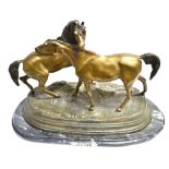 A LARGE PATINATED BRONZE GROUP OF TWO HORSES on oval marble plinth labelled 'L'Accolade by P J