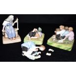 THREE 19TH CENTURY RUSSIAN GARDNER PORCELAIN FACTORY GROUPS: one modelled as two children wrestling,