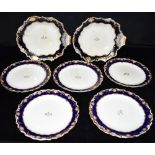 A SET OF SIX VICTORIAN GEORGE JONES CRESCENT DESSERT PLATES 22cm diameter, and a matching pair of