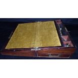 A VICTORIAN BRASS BOUND WRITING SLOPE with fitted interior, drawer to base secured by pin