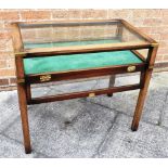 A 20TH CENTURY MAHOGANY DISPLAY CABINET the top of rectangular form with green beize interior and