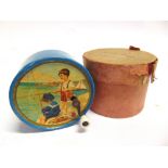 A HAND-WOUND DRUM MUSICAL BOX probably German, with a blue painted metal body, the top with a