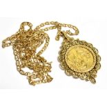 AN EDWARDIAN GOLD SOVEREIGN PENDANT The 1902 full gold sovereign loosely mounted in a marked 9ct