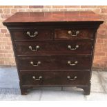 MAHOGANY CHEST OF TWO SHORT OVER THREE LONG GRADUATING DRAWERS with each drawer having a brass