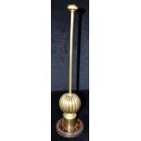 A BRASS, OAK AND CAST IRON DOORSTOP 46cm high Condition Report : overall signs of wear, and a slight