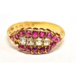 AN 18CT GOLD VICTORIAN DIAMOND AND RUBY DRESS RING Set with four old mine cut diamonds and