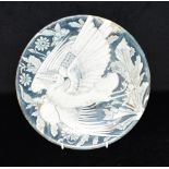 A VICTORIAN PLATE decorated in the Aesthetic manner with pair of birds, 24cm diameter Condition