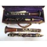 TWO CLARINETS comprising a Hawkes 'Excelsior Class', cased (lacking final, short body section);