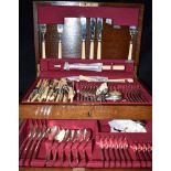 A WOODEN CASED CANTEEN OF POSTONS LONSDALE SILVER PLATED CUTLERY Together with a pair of early