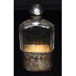 A VICTORIAN SILVER TOP AND SILVER BASE RIBBED GLASS HIP FLASK hallmarked for London 1877 with