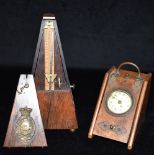 A WALNUT CASED CLOCK in the form of a purdonium, together with a rosewood cased metronome by