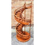 A MAHOGANY SPIRAL STAIRCASE H 108cm