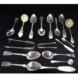 A COLLECTION OF EARLY 19TH CENTURY AND LATER SILVER FLATWARE To include strain spoons, weight