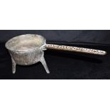 AN 18TH CENTURY BRONZE SKILLET on three prong feet, the handle cast 'COX TAUNTON V', 44cm long