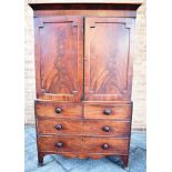 VICTORIAN MAHOGANY LINEN PRESS the upper section having a cornice above twin doors opening to reveal