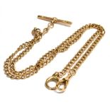 A 9CT ROSE GOLD DOUBLE ALBERT CHAIN AND T BAR Fitted with a 9ct rose gold Albert swivel clasp chain,
