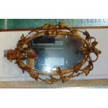 19TH CENTURY THREE LIGHT GIRANDOLE MIRROR the plate of oval form, measuring H 58cm x W 35cm surround