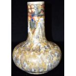 A CRANSTON POTTERY VASE with tubelined decoration of leaves and berries, 28.5cm high Condition