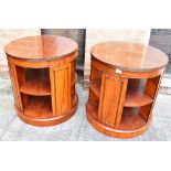 PAIR OF CIRCULAR THREE TIERED SWIVEL BOOKCASE TABLES H 63cm