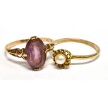 TWO 9CT GOLD DRESS RINGS A marked 9ct gold Amethyst dress ring, ring size M, weight 1.9g; together