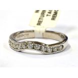 A PLATINUM AND MOISSANITE WISHBONE RING boxed and certified, marked 950 Birmingham, ring size L.