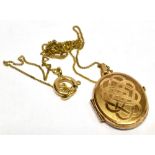 A VINTAGE 9CT GOLD LOCKET AND CHAIN The locket front with a Celtic motif and measuring approx. 2cm x