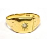 AN 18CT GOLD GOSHENITE STAR SET SIGNET RING The ring stamped 18ct, maker R.P., ring size X, weight