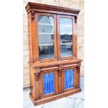 VICTORIAN MAHOGANY BOOKCASE CABINET the upper section having a cornice above twin glazed doors