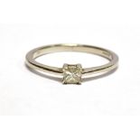 A PLATINUM AND DIAMOND SOLITAIRE RING the princess cut diamond measuring approx. 4mm in diameter,