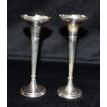 A PAIR OF ART DECO SILVER WEIGHTED TRUMPET VASES Hallmarked for Chester 1923, height 17cm and 17.5