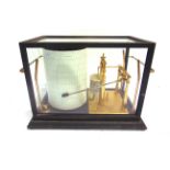 A MICRO-BAROGRAPH, BY SHORT & MASON, LONDON serial number 562/41 /56, in a glazed metal case,