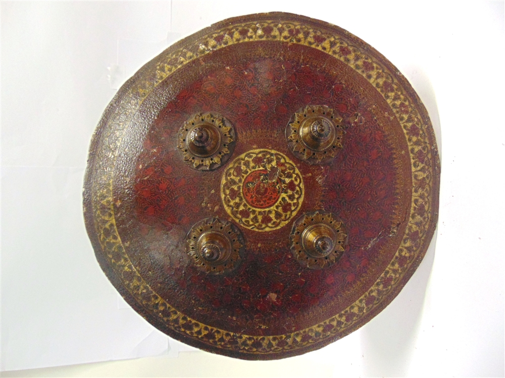 AN INDO-PERSIAN DHAL SHIELD 19th century, set with four brass studs and with elaborate painted